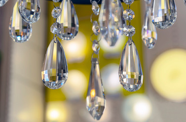Elements of crystal chandelier in the interior of the store.