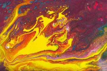 Red and yellow marbling pattern. Golden marble liquid texture.