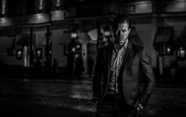 Film Noir / Night Portrait of a handsome Caucasian male