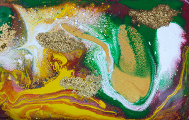 Multicolored gold marbling pattern. Golden marble liquid texture.