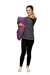 Fototapeta premium Full body Pretty woman in pajamas counting five with fingers on isolated background