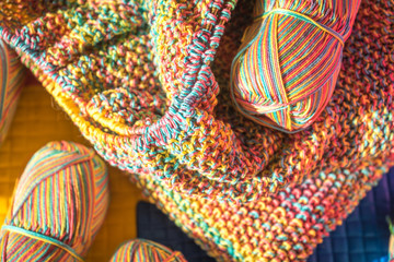 Knitting skein on a multicolored background.