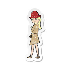 retro distressed sticker of a cartoon female spy