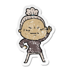distressed sticker of a cartoon annoyed old lady