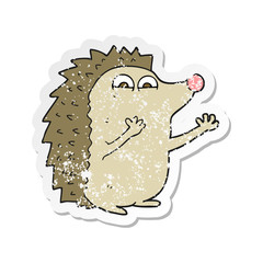 retro distressed sticker of a cartoon cute hedgehog
