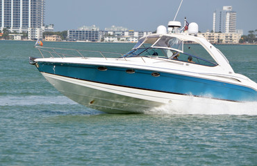 Well appointed blue and white cabin cruiser 