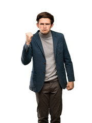 Teenager man with turtleneck with angry gesture over isolated white background