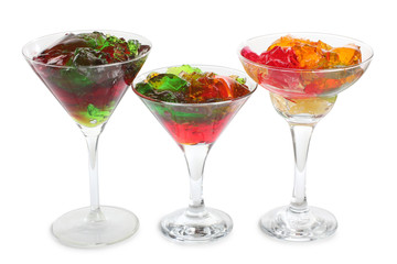 Coctail in a glass with raw fruit on white background