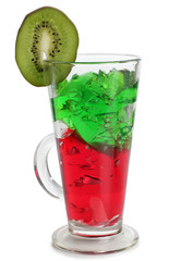Coctail in a glass with raw fruit on white background