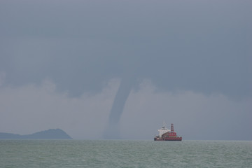 A waterspout is an intense columnar vortex that occurs over a body of water