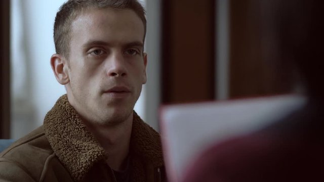 anxious man with tics talking with his psychiatrist.psychotherapy,diseases