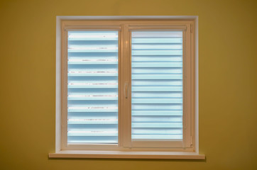 White plastic glazing. White double or triple plastic window isolated at home room