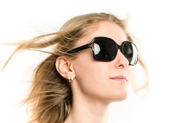 Fototapeta premium face of a pretty girl blonde in sunglasses close-up on a white background