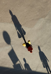Funny shadows on the sidewalk