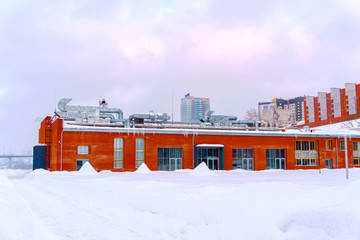 winter urban landscape with industrial architecture
