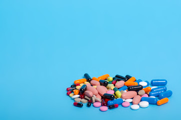 Pills capsule pharmasy medecine on blue background