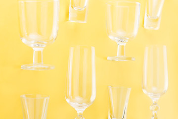 Collection of various glasses on bright background, copy space