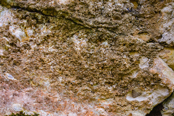 Closeup - beautiful structure of an ancient rock texture formation. Concept of natural background and screen saver. Advertising space