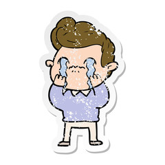 distressed sticker of a cartoon man crying