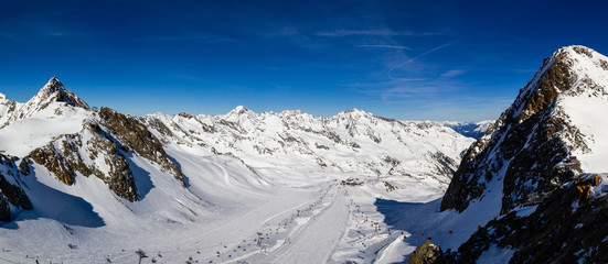Panoramic view to the central slopes and lifts from the Top of Tirol platform in the Kingdom of snow Stubaier Gletscher ski resort in the Stubai valley, Tirol, Austria
