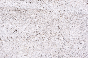 Eine alte Steinmauer mit schöner Struktur als Hintergrund