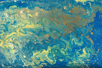 Blue gold marbling pattern. Golden marble liquid texture.