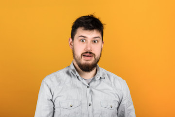 bearded man In shock face, looking skeptical and sarcastic, surprised with open mouth