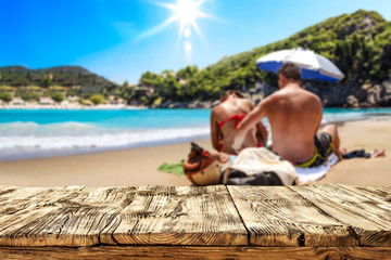Desk of free space for your decoration. Beach landscape with two lovers on sand. Summer time. 