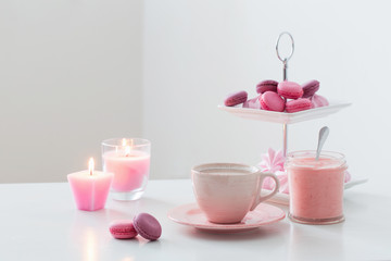 cup of coffee with dessert on white table