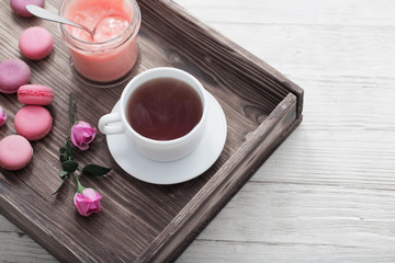 breakfast with tea  on wooden tray