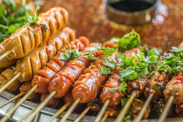Thailand street food, prawns, sausages, hotdogs, chicken and meatballs