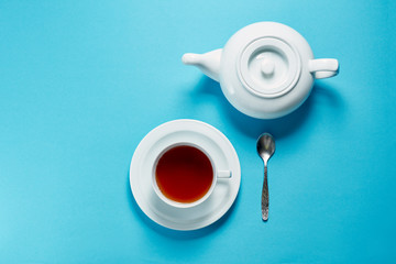 Thyme herbal tea, view from above, space for a text on blue background top view copyspace