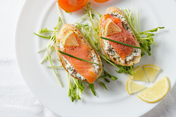 Ricotta and salmon on bread.