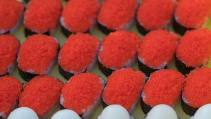 Red caviar, fish egg in sushi rolls