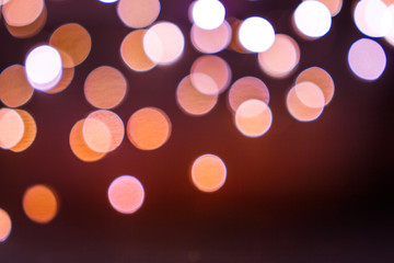Red glitter vintage lights background. defocused