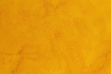 turmeric or curcumin longa powder isolated as herb or spice texture yellow food background - obrazy, fototapety, plakaty