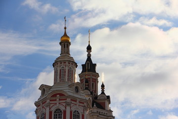 Fototapeta na wymiar Cathedral of Vernicle in the centre of the city near metro station Teatralnaya on blue sky with clouds background