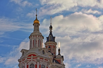 Fototapeta na wymiar Cathedral of Vernicle in the centre of the city near metro station Teatralnaya on blue sky with clouds background