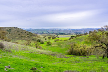 Fototapeta na wymiar Panoramic view over the hills and valley of Coyote Valley Open Space Preserve, Morgan Hill, south San Francisco bay area, California