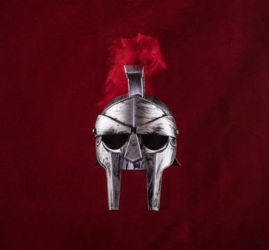 spartan helmet on a red background