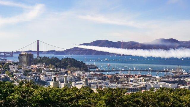 Fighter Airplanes flying over Golden Gate as seen from the top of Telegraph Hill, San Francisco