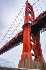 Golden Gate bridge as seen from below on a cloudy day, San Francisco