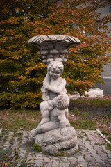 Statue children autumn Park