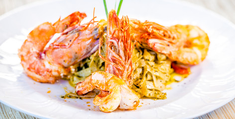 Fine dining organic food pasta with prawns and mussel seafood