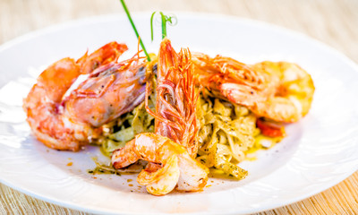 Fine dining organic food pasta with prawns and mussel seafood