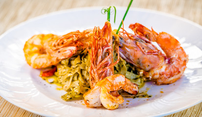 Fine dining organic food pasta with prawns and mussel seafood