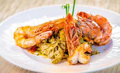 Fine dining organic food pasta with prawns and mussel seafood