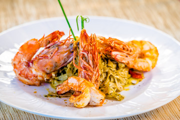 Fine dining organic food pasta with prawns and mussel seafood