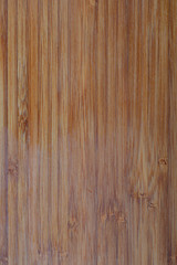 Rustic bamboo texture. Vertical lines. Ocher and brown tones.