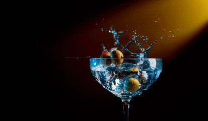 Dry martini with green olives.